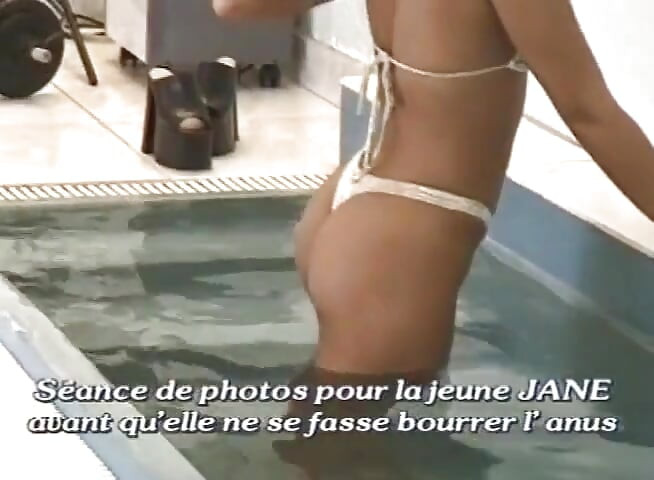 Sexy brunette gets anally plowed near the swimming pool