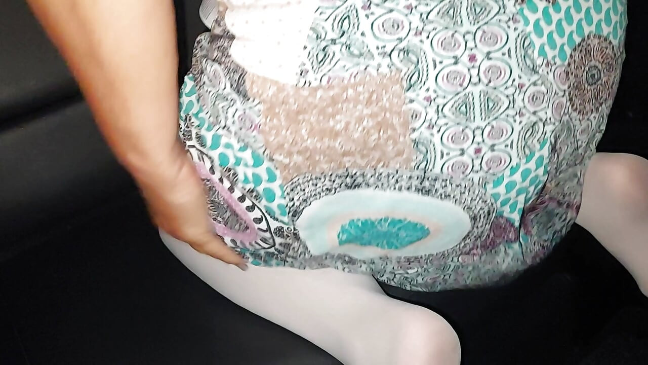 Sexy milf with big ass and big tits spreads her legs in the backseat of the car in public