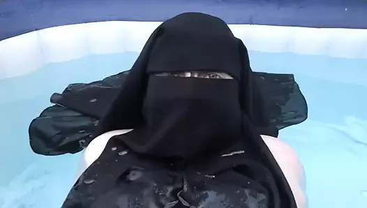 naked in Niqab in the hot tub