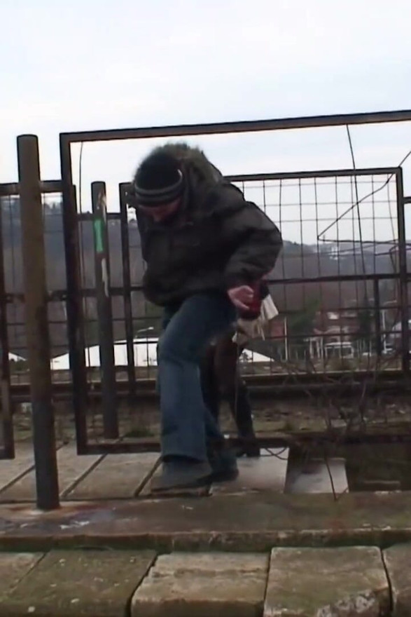 Brunette fucking with old dude next to a railway