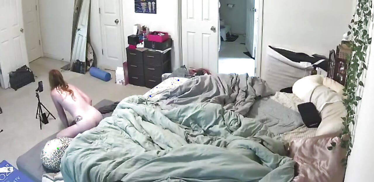 Webcam catches MILF riding dildo