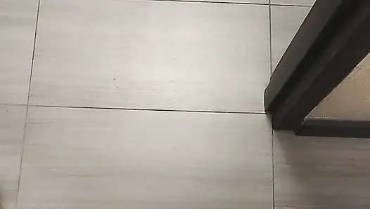 Jerking and cumming in public bathroom hallway