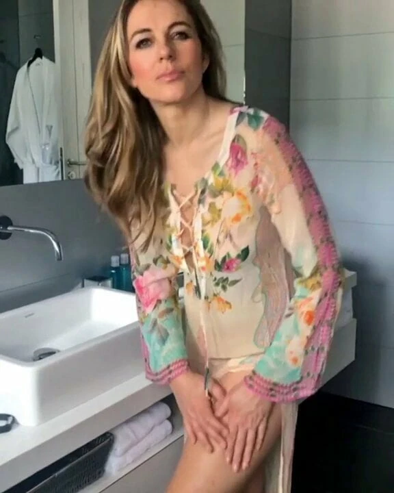 Elizabeth Hurley anointing herself before sunbathing 2019