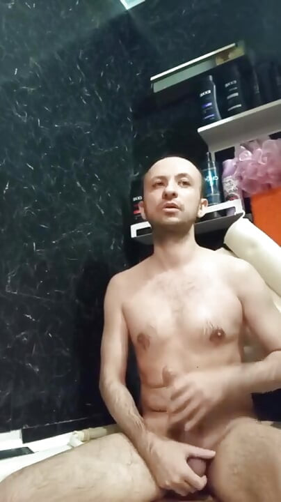 A Naked Man Jerks off His Big Dick in the Bathroom