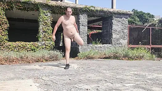 Boy completely naked near the sea