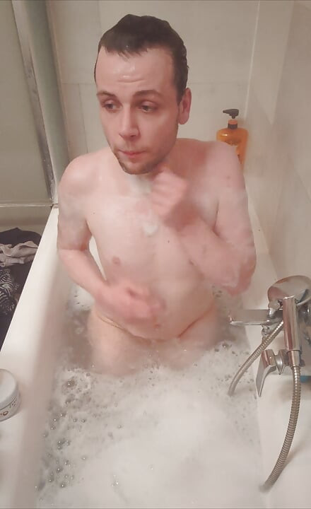 Horny boy in the bathtub