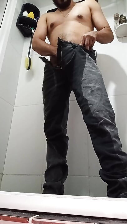 Urinating in Dark Jeans