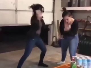 Cleavage girls bashing beer cans on their heads