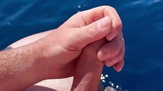Wanking and cum at the sea