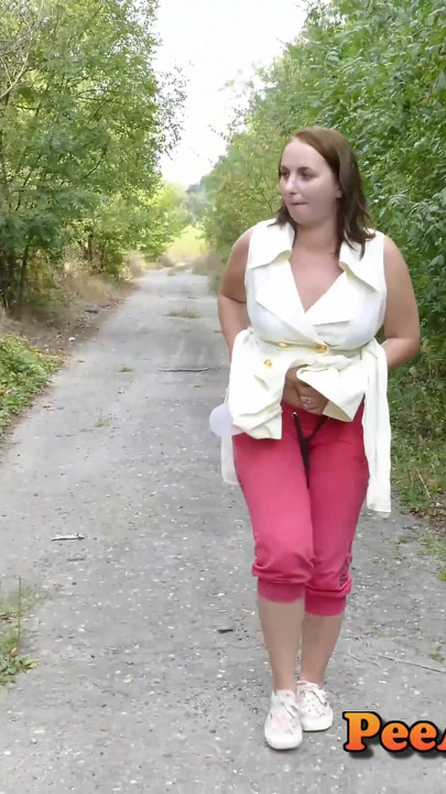 Chubby brunette pissing a lot