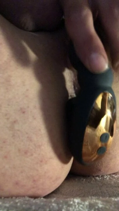Rotating prostate massager with huge cock in a chastity