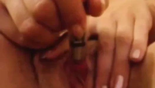 Wife playing with mini vibrator-nice orgasmic contractions.