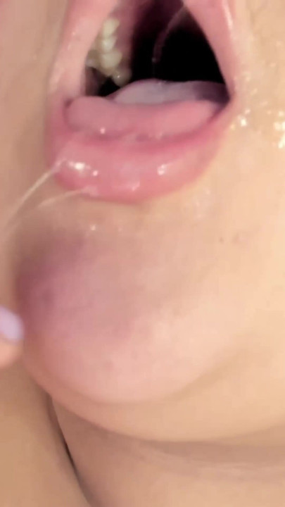 I choke completely on my huge dildo, filling it with saliva and putting my fingers in it