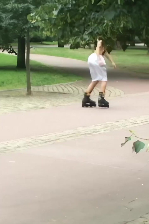 Five Skaters Hook up at the Edge of the City Park