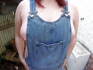 Wife in wellingtons and dungarees in the yard