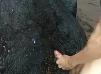 Cum shooting on the beach