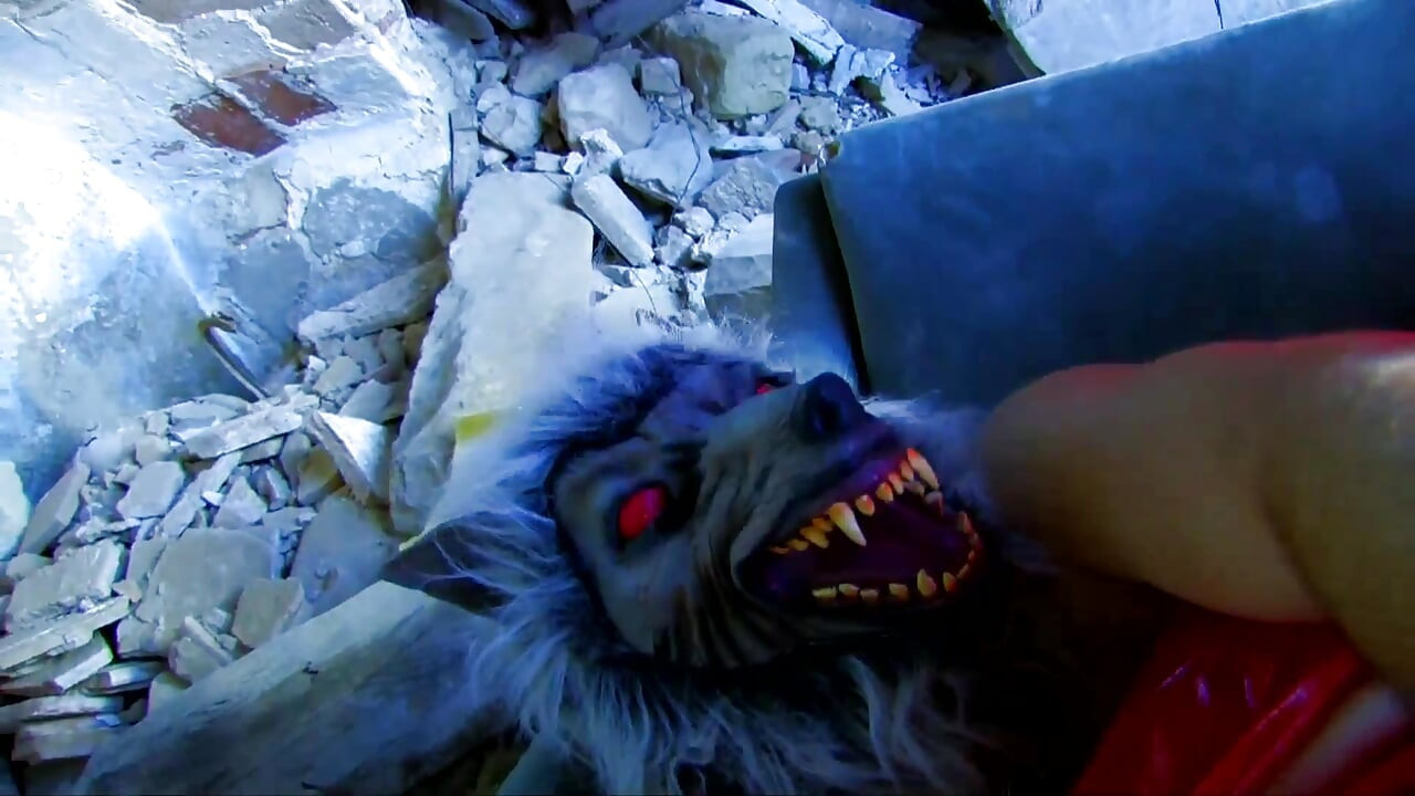 Sexy little red riding hood gives a blowjob to the werewolf
