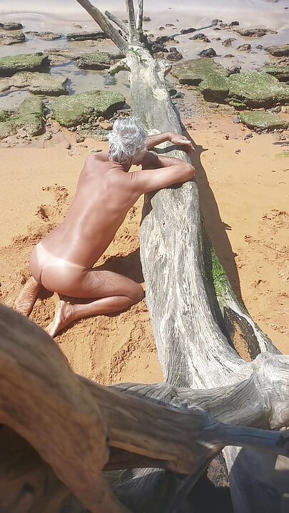 Ladysilva on the beach naked showing off her tanned sexy ass