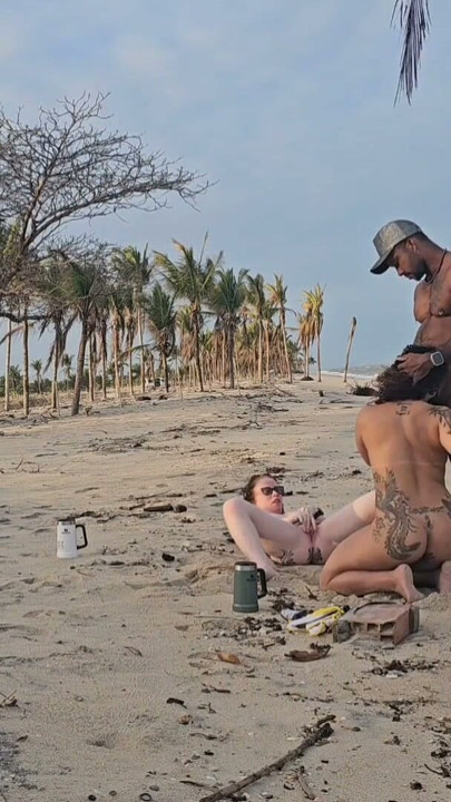 TWO LESBIAN CHICKS PLAYING ON THE BEACH GOT PICKED UP BY A TOURIST AND HAD THEIR ASSES FUCKED | Clip 1