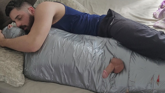 bearded dom using mummified guy as a toy