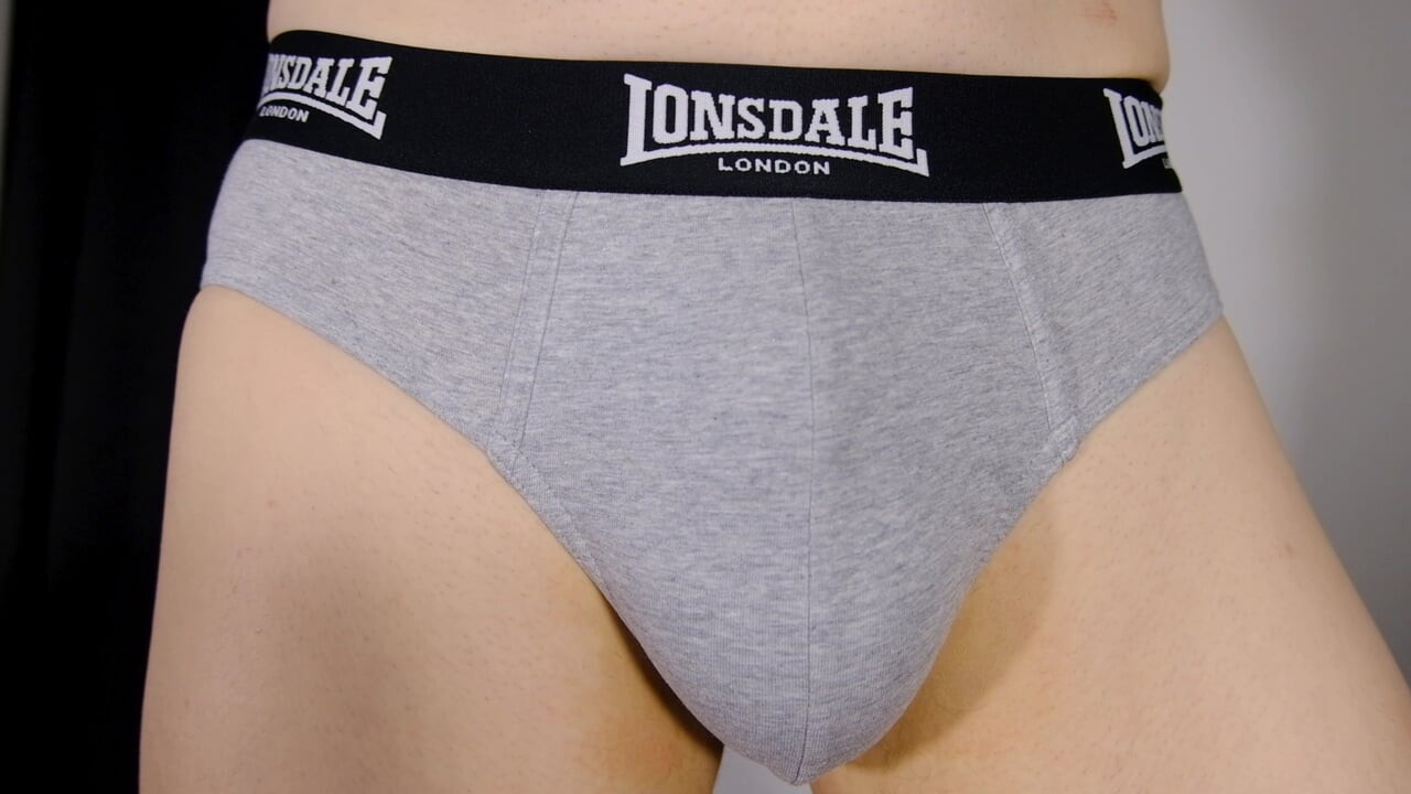 Close up underpants show flaccid shaved uncut penis and foreskin for everyone to see