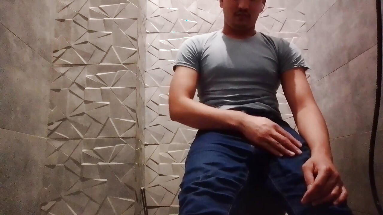 Indian Handsome Boy Masturbates Hard While His Penis Is Inside the Bathroom