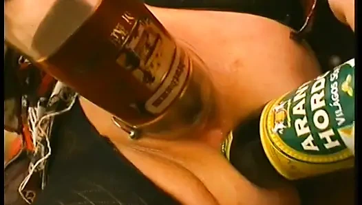 Clothed chubby mature slut drilling her holes with bottles and banana