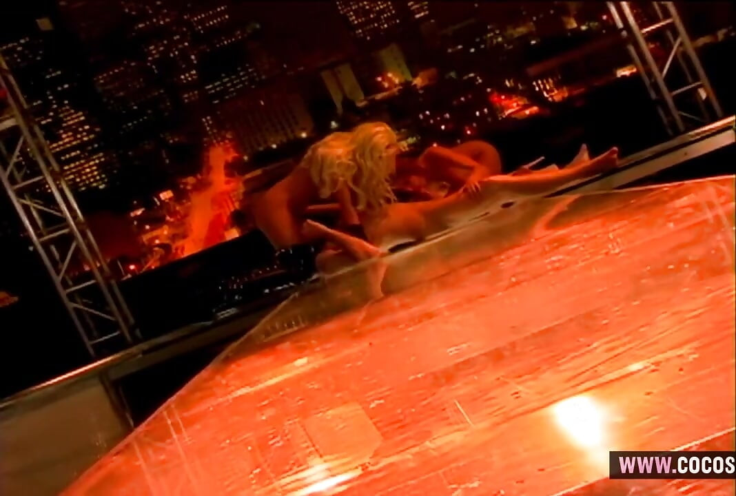 Erotic Nighttime Stage Performance with Blonde Redhead and