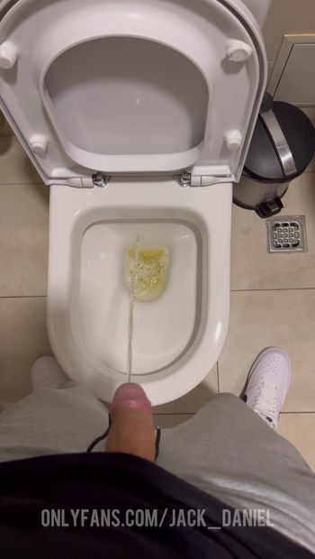 GUY PISSING IN TOILET