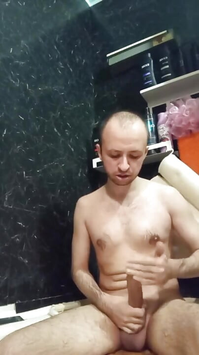 A Naked Man Jerks off His Big Dick in the Bathroom