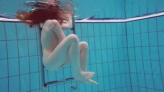 Pretty Polish teen Alice swimming without clothes on