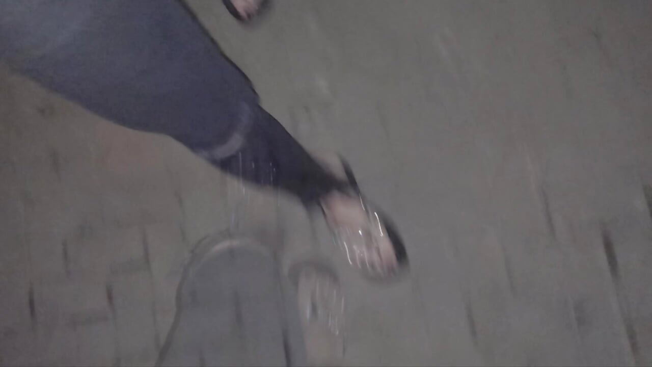 I wear platform flip-flops and tight jeans, showing off my feet.