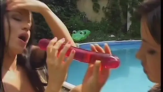 Two Brunette Babes Enjoy Licking and Fingering Their Pussies Near the Pool