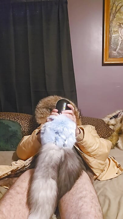 In my big furry hood using penis pump wrapped in furs and tails