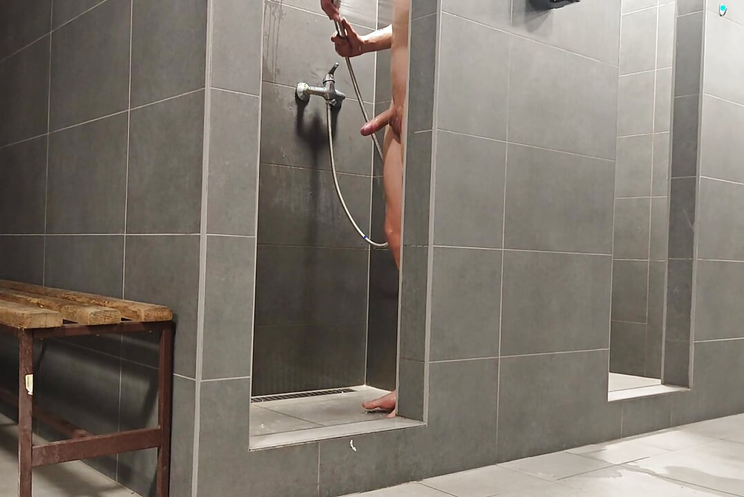Young skinny box Is showering And recording himself in public bathroom