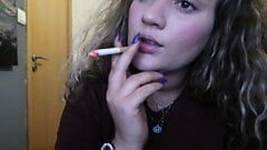 CLOSE-UP CIGAR SMOKE BY A SEXY BLONDE WOMAN