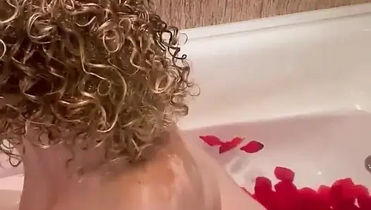 Merce Masturbates in a Bathtub Full of Petals with the Shower Head