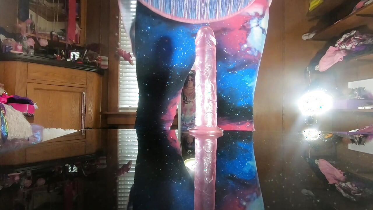 Trans slut Daphne fucks herself on the table with her pink dildo