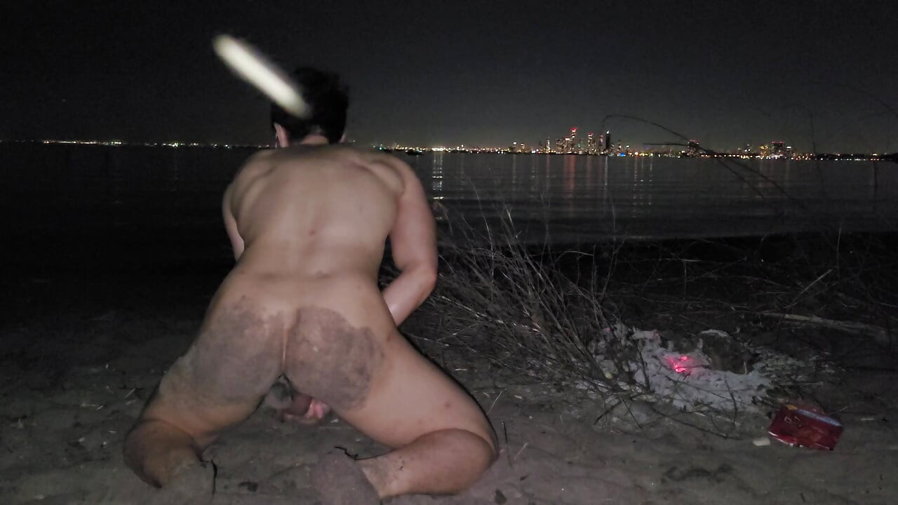 oiled masturbating and piss on the nude beach at night
