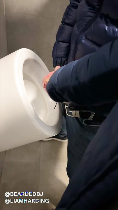 hot daddy with big cock gets sucked in public bathroom by sexy bear