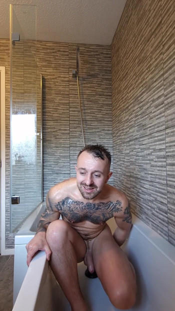 Epic moment from "Cage warrior Carl loves a red hot shower with his huge toys and a big treat for the fans at the end"