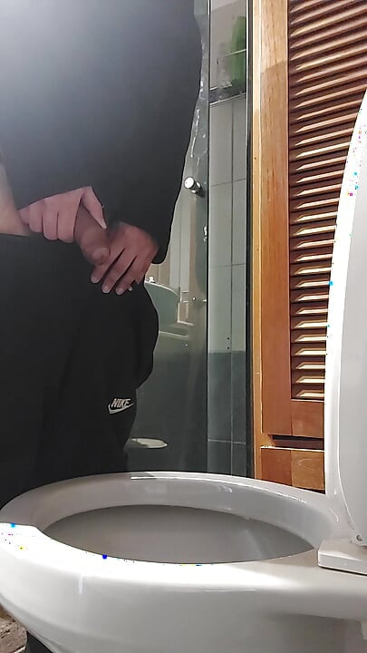 Peeing with a hard cock