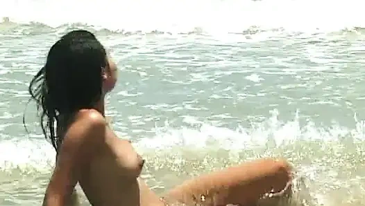 Cute girls love playing on the beach