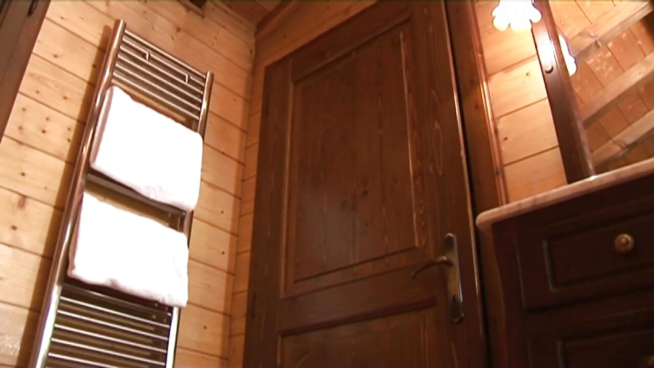 Naughty and naked woman banged by a younger boy in a chalet