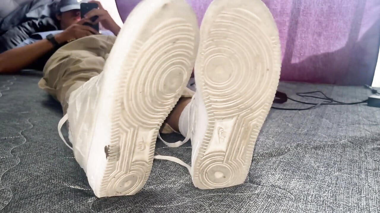 A University Rests Her Feet on Her Face so That the Adorers