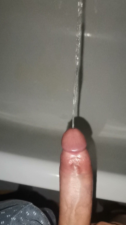 A powerful stream from a hard cock