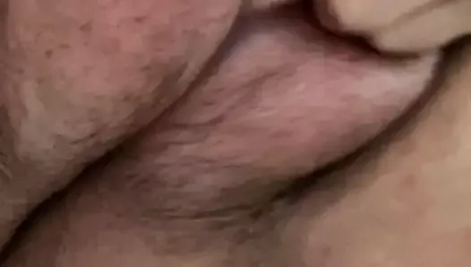 Playing with my hairy, saline filled pussy lips