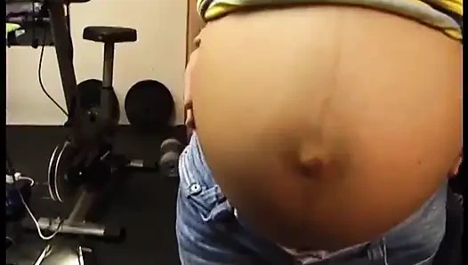 Raven hair pregnant babe blows guy's dong in gym and fucks it