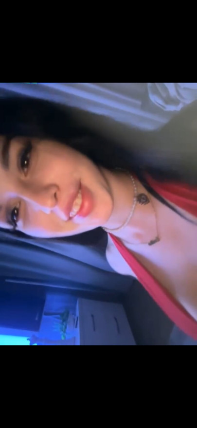These tits are barely staying in this red top