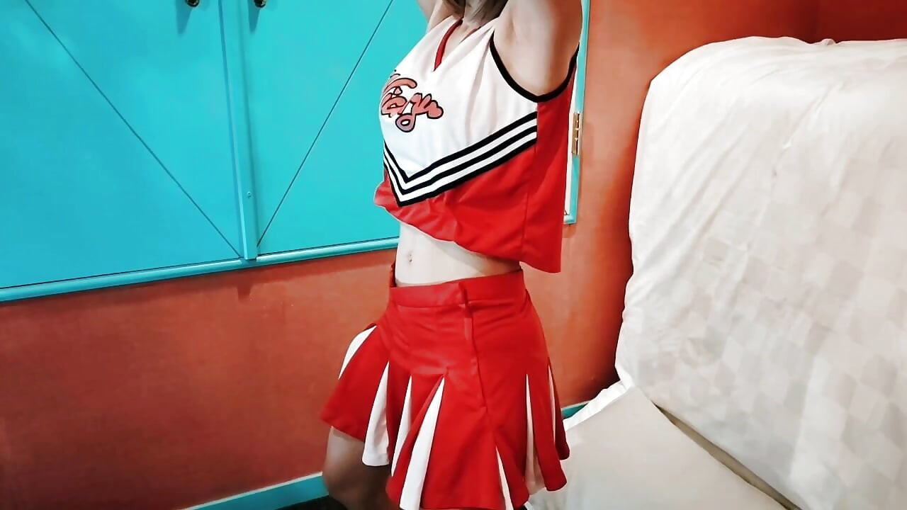 A cute busty married woman exercises 2 in a sexy cheerleader costume. Home made amateur Private Shoot